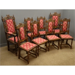  Set eight (6+2) Carolean style oak dining chairs, carved cresting rail, upholstered back and seat, turned and reeded supports joined by stretchers  