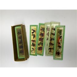 Six boxes of mainly mid-19th century juvenile panoramic coloured glass magic lantern slides, mostly of a comical nature, one box with Ernst Plank label, approximately 100 slides