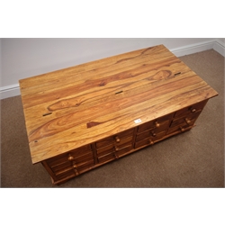  Hardwood coffee table, hinged lid, twelve drawers, shaped bracket supports, 118cm x 66cm, H44cm  