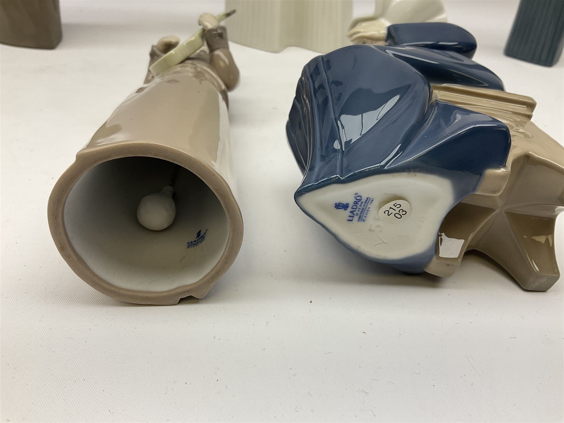 Three Lladro figures of nuns comprising Prayerful Moment no. 5500, Time to Sew no. 5501 and Two Nuns model no. 4611, together with figure of a monk no. 2060, and further Lladro bell figure