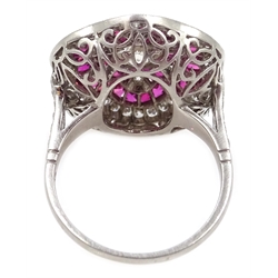  Large platinum (tested) ruby and diamond flower head ring, with diamond shoulders  
