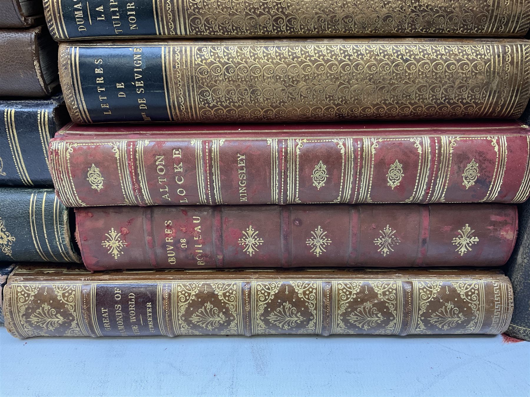 Twenty-seven 19th century leather bound books including The History of Napoleon Edited by R.H. Horne.1841; The Great Diamonds of the World by Edwin W. Streeter. 1882 Second edition; works by Voltaire; etc (27)