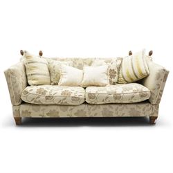 Traditional knoll sofa, upholstered in cream and olive floral fabric, adjustable drop ends...
