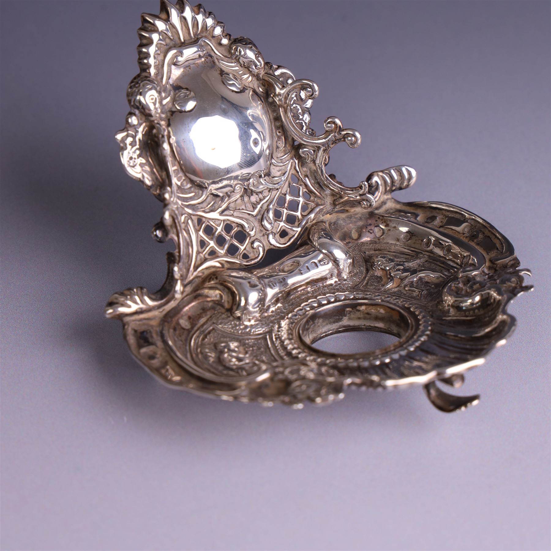 Modern silver mounted bottle coaster, with turned wooden base, hallmarked Carrs of Sheffield Ltd, Sheffield 2003 and a Victorian silver inkwell stand, hallmarks worn and indistinct, coaster D10cm