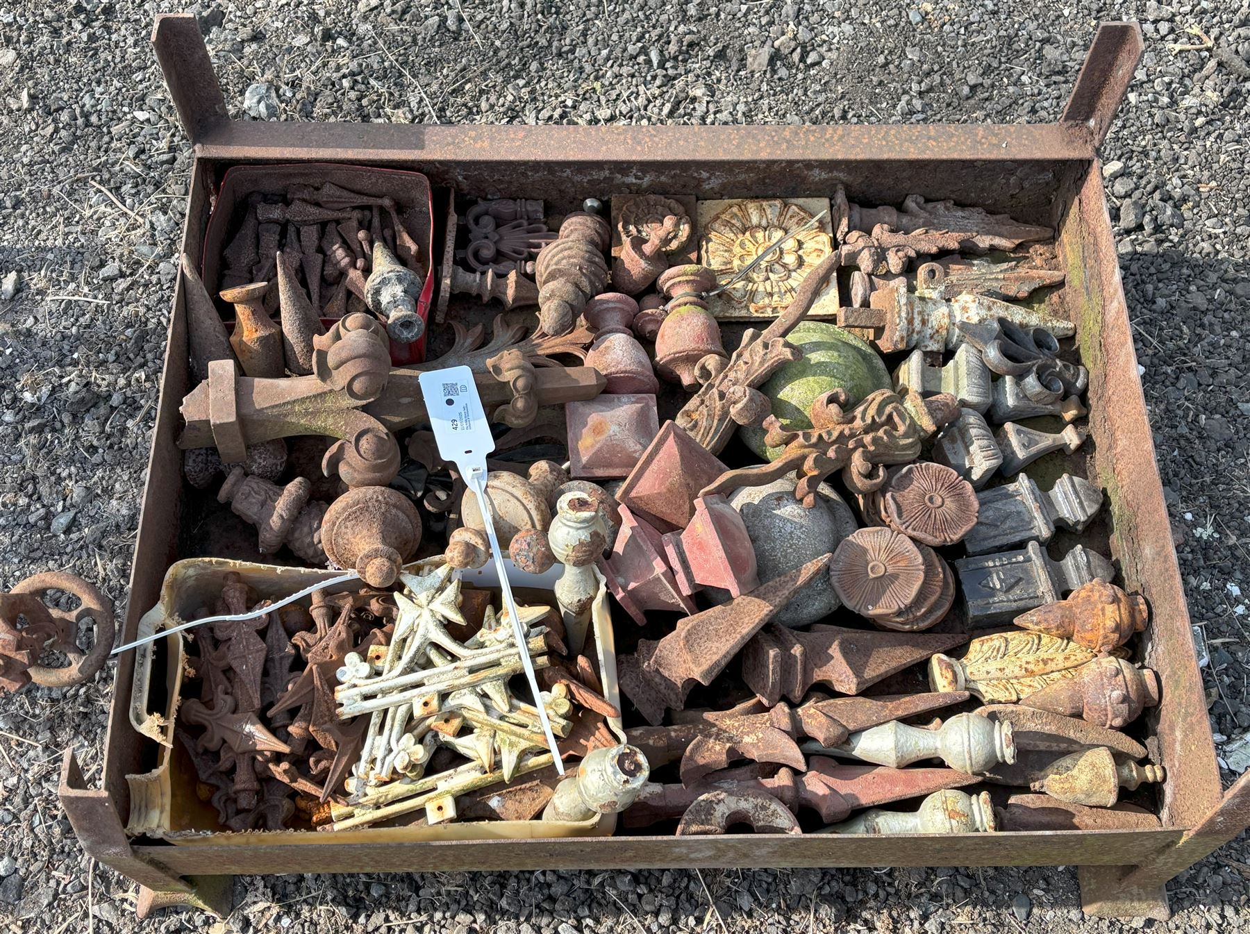 Group of cast iron finials and decorative objects, sold within a stillage.  - COLLECTION BY APPOINTMENT FROM: The White House, Thirsk Road, Easingwold, York, YO61 3NF - CALL 01723 507111 TO ARRANGE