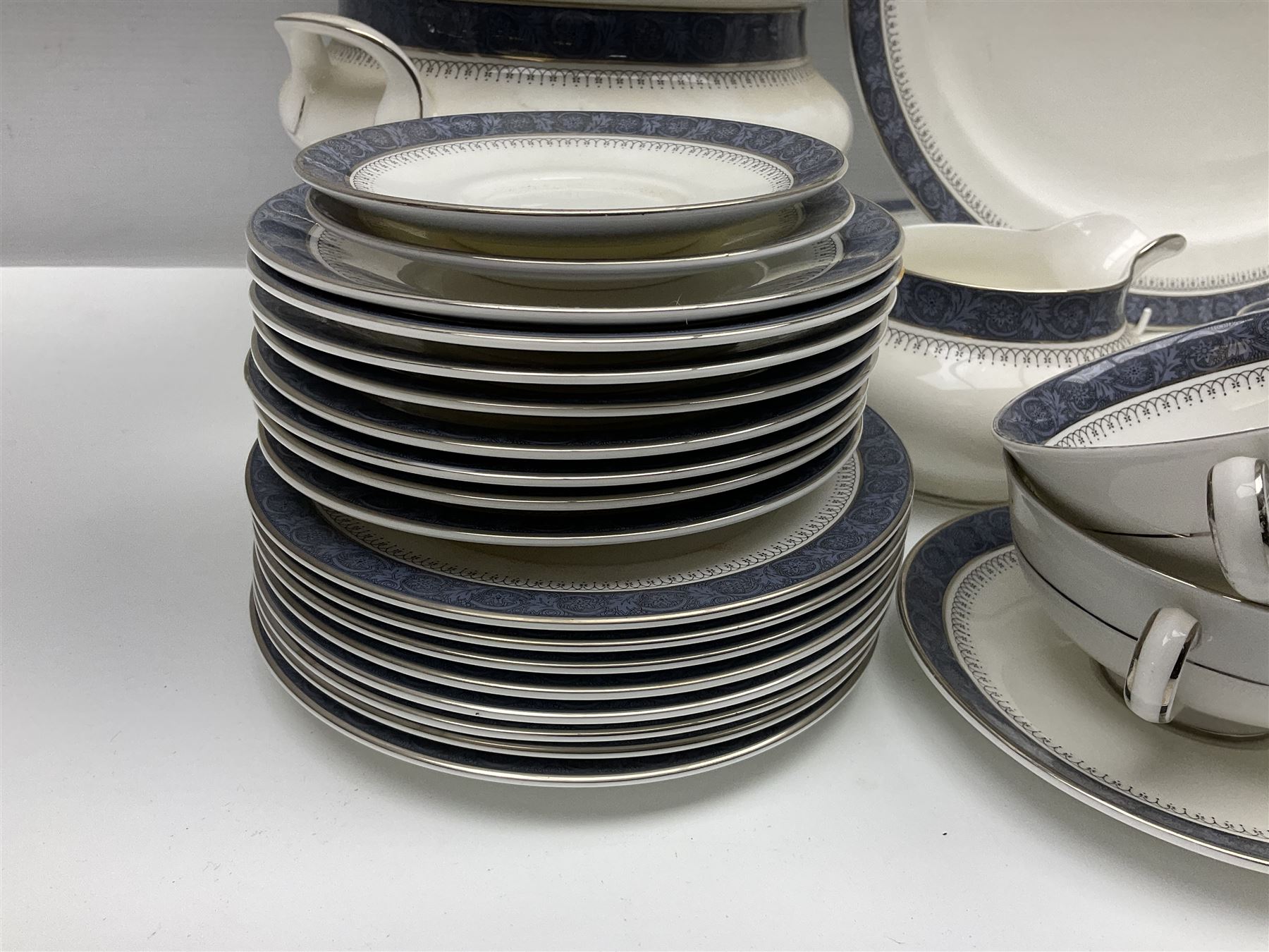 Royal Doulton Sherbrooke pattern part dinner and tea service, to include teapot, ten twin handled soup bowls and saucers, two serving platters, three twin handled covered dishes etc (63)  