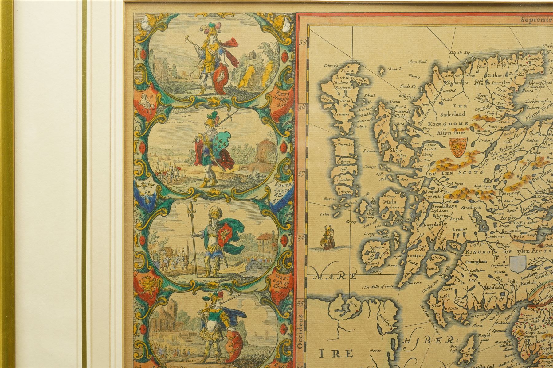 Johannes (Joan) Blaeu (Dutch 1571-1638): 'Britannia Prout Divisa fuit Temporibus Anglo-Saxonum Praesertim Durante Illorum Heptarchia' (Britain as it was Divided During the Anglo-Saxon Times), engraved map of the British Isles with hand-colouring and 14 Dutch style miniature vignettes depicting kings and scenes from Saxon history, later edition 43cm x 54cm