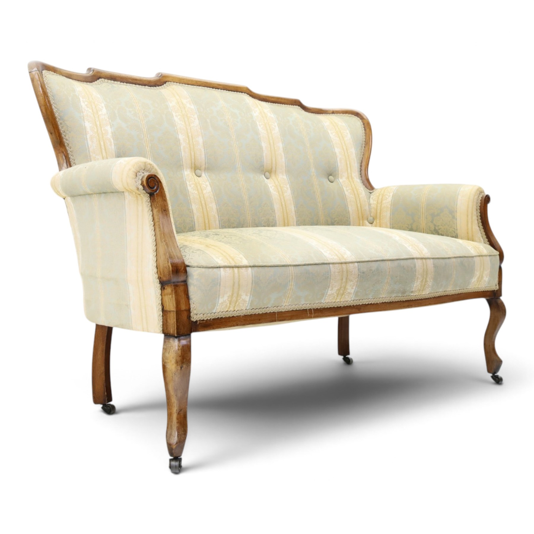 Edwardian mahogany three-piece salon suite, comprising settee and two armchairs, shaped frames with upholstered backs, scrolled arm supports and serpentine seat rails, upholstered in striped floral damask fabric, on cabriole supports with castors (Armchairs: H 96cm, W 70cm, D 68cm)