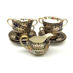 19th century Copeland Spode tea wares, comprising milk jug, and six teacups and six saucers, each decorated with floral panels within a dark blue surround and heighted with gilt, with pattern no 3803 beneath. 