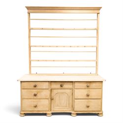 Victorian stripped pine dresser base with plate rack, the four-tier plate rack with suppor...