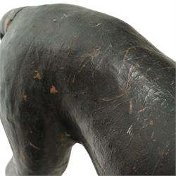 Early 20th century leather-covered decorative model of a Panther in a naturalistic stance, prowling forward with arched back, lowered head, and extended tail, open jaws revealing teeth and fangs with nylon whiskers