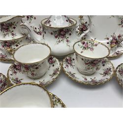 Royal Albert Cottage Garden pattern tea service for six people, comprising teapot, milk jug, sugar bowl, teacups and saucers, side plates and cake plate, all with printed mark beneath