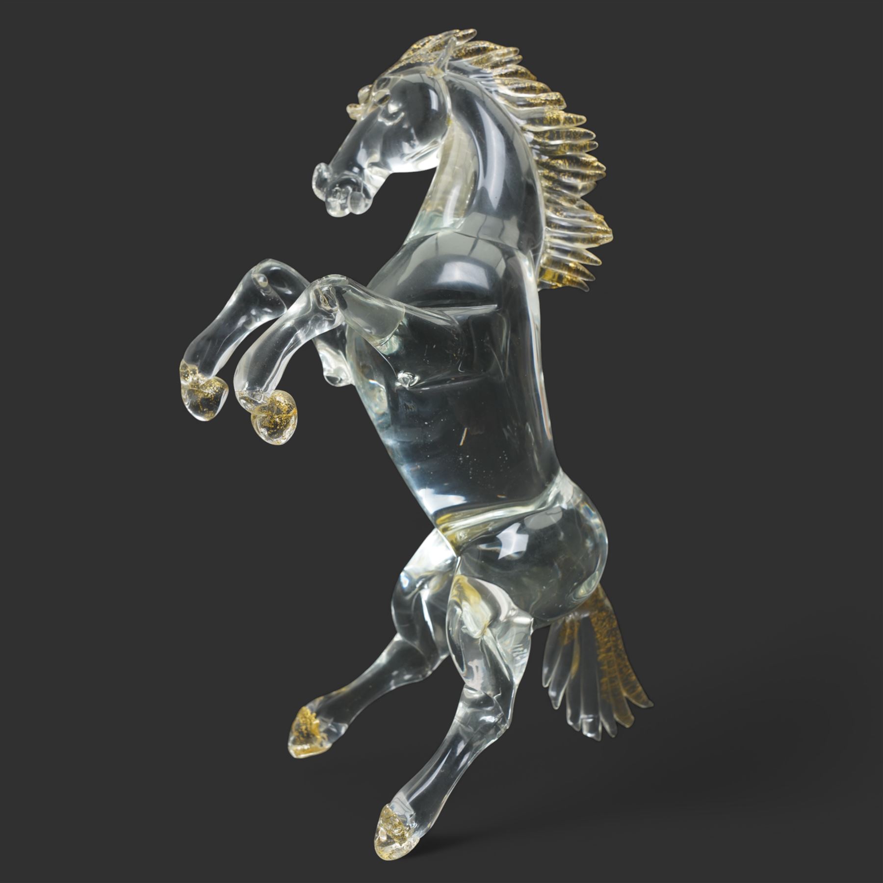 After Oscar Zanetti - Two Murano glass rearing horses with aventurine details to mane tail and hooves, larger 35cm and a Murano dolphin H24cm (3)