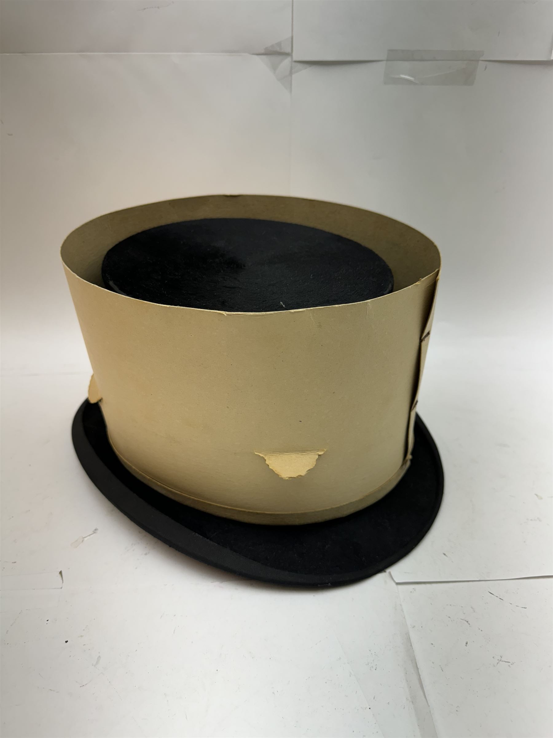 Akubra pure fur felt trilby hat, together with another trilby and two top hats, one by Woodrow and one by Dunn & Co
