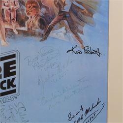 Autographed 1980s Star Wars Empire Strikes Back movie poster, with artwork by Tom Jung, with signatures including Michael Sheard (Admiral Ozzel), Koo Stark, Caroline Blakiston (Mon Mothma), Shelagh Fraser (Aunt Beru), Mike Edmonds (Logray), Peter Mayhew (Chewbacca), Jeremy Bulloch (Boba Fett), Stuart Freeborn (Creature Designer), Warwick Davies (Wicket), Michael Carter (Bib Fortuna), Dave Prowse (Darth Vader), Kenny Baker (R2D2), signatures and poster obtained at the Dave Prowse Promotions Mulitcon Event 1998 at The Norbreck Caste Hotel, Blackpool, in glazed black frame, frame H115cm