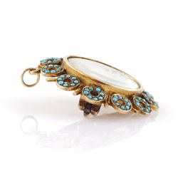 19th century gold turquoise portrait brooch / pendant, set with a circular portrait of a woman in 18th century dress on ivory, under a glazed panel, within an alternating surround of turquoise set hoops and gold spokes. This lot has been registered for sale under Section 10 of the APHA Ivory Act