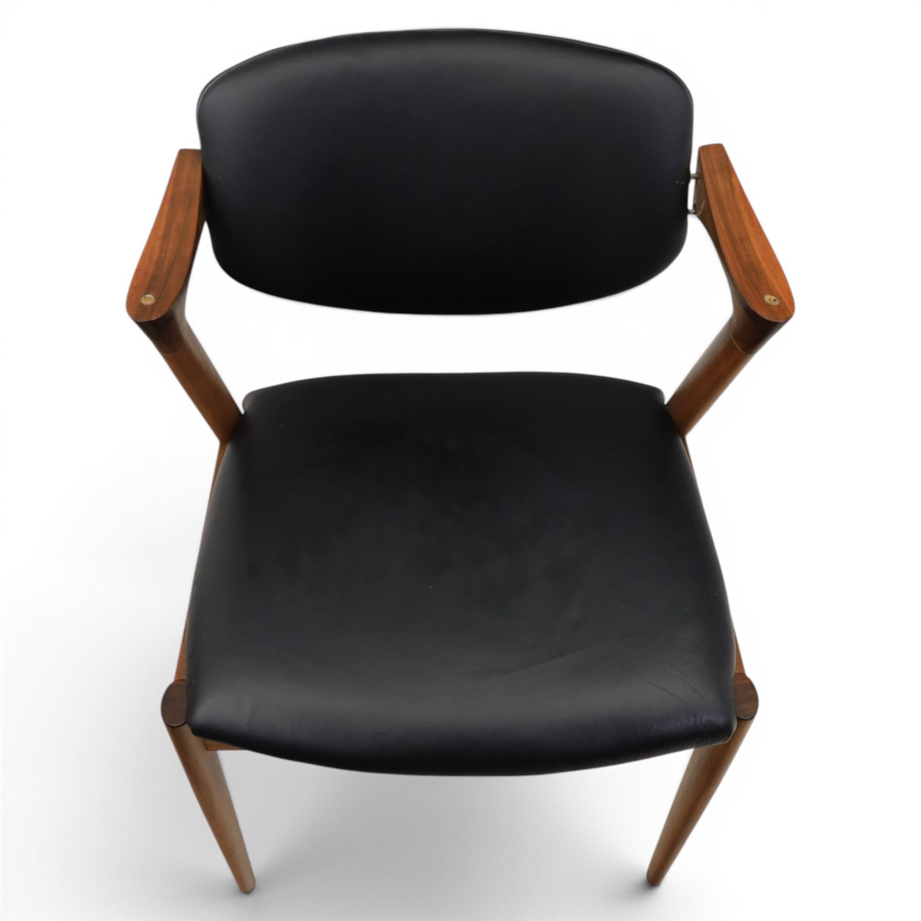Kai Kristiansen (Danish c.1929-2022) - Pair of mid-20th century teak elbow chairs upholstered in black leatherette