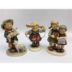 Twenty five Hummel figures by Goebel, to include Tuning up, Blessed Event, Book Worm, The Little Architect etc 