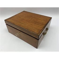 19th century satinwood travelling toilet box with twin drop handles, the hinged cover opening to reveal a compartmented interior with two clear glass bottles with stoppers, six smaller bottles with screw threaded tops, and five divisions, three with covers, two with pull out boxes with sliding covers, H13cm W31cm D25.5cm