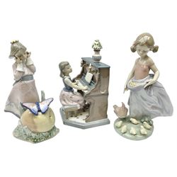 Three Lladro figures, comprising Practice Makes Perfect no 5462, Land of Giant no 5716 and Afternoon Snack no 6577, all in original boxes, largest example H22cm