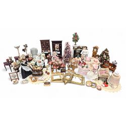 Dolls house living room and ding room furniture, including sofa, chair, long case clock, Christmas trees, fireplace, dresser, chairs, tables, mirrors, seven figures and a collection of predominantly Christmas themed decorations, food, etc