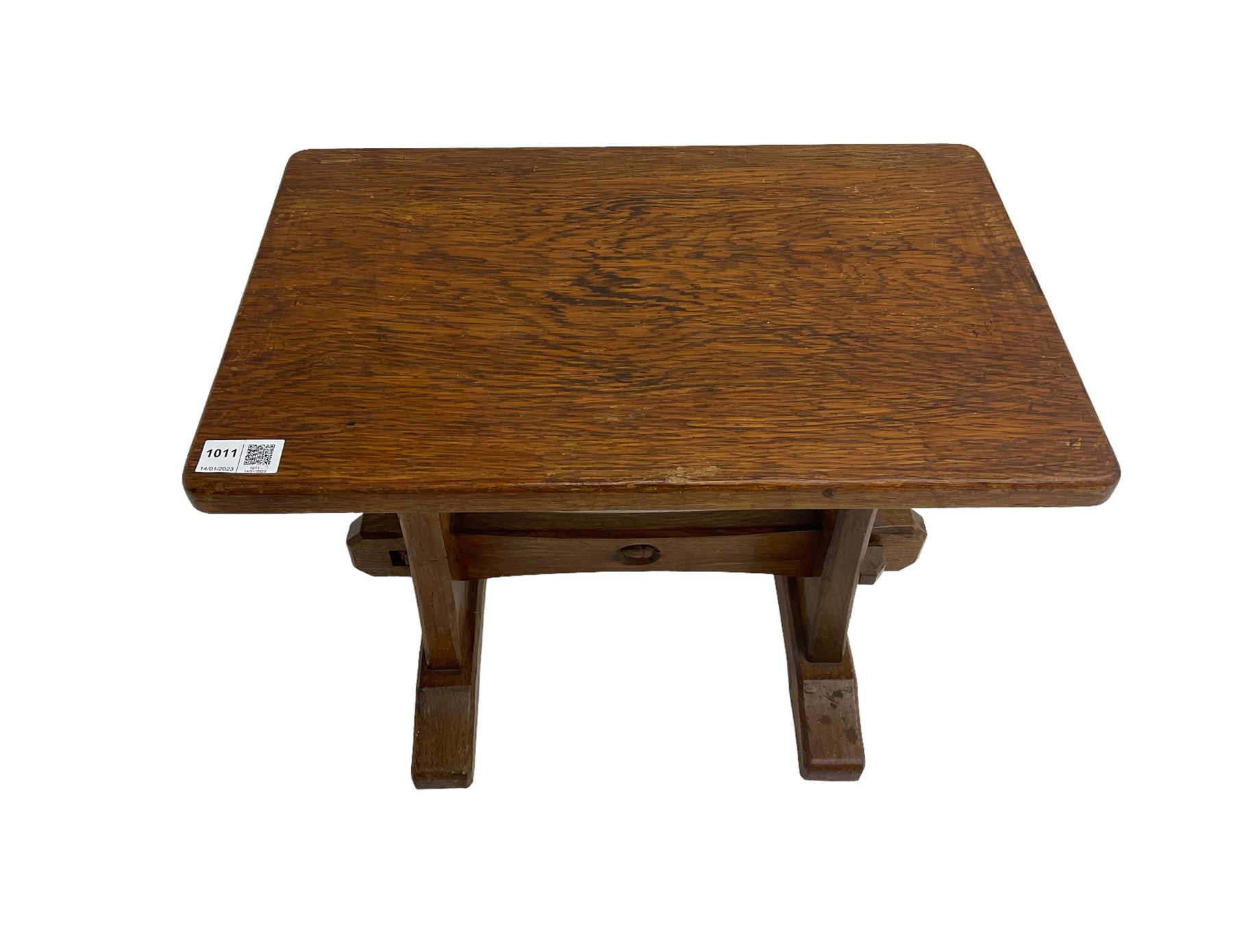 Acornman - oak occasional or side table, rectangular adzed top on shaped end supports joined by pegged stretcher on sledge feet, by Alan Grainger of Brandsby