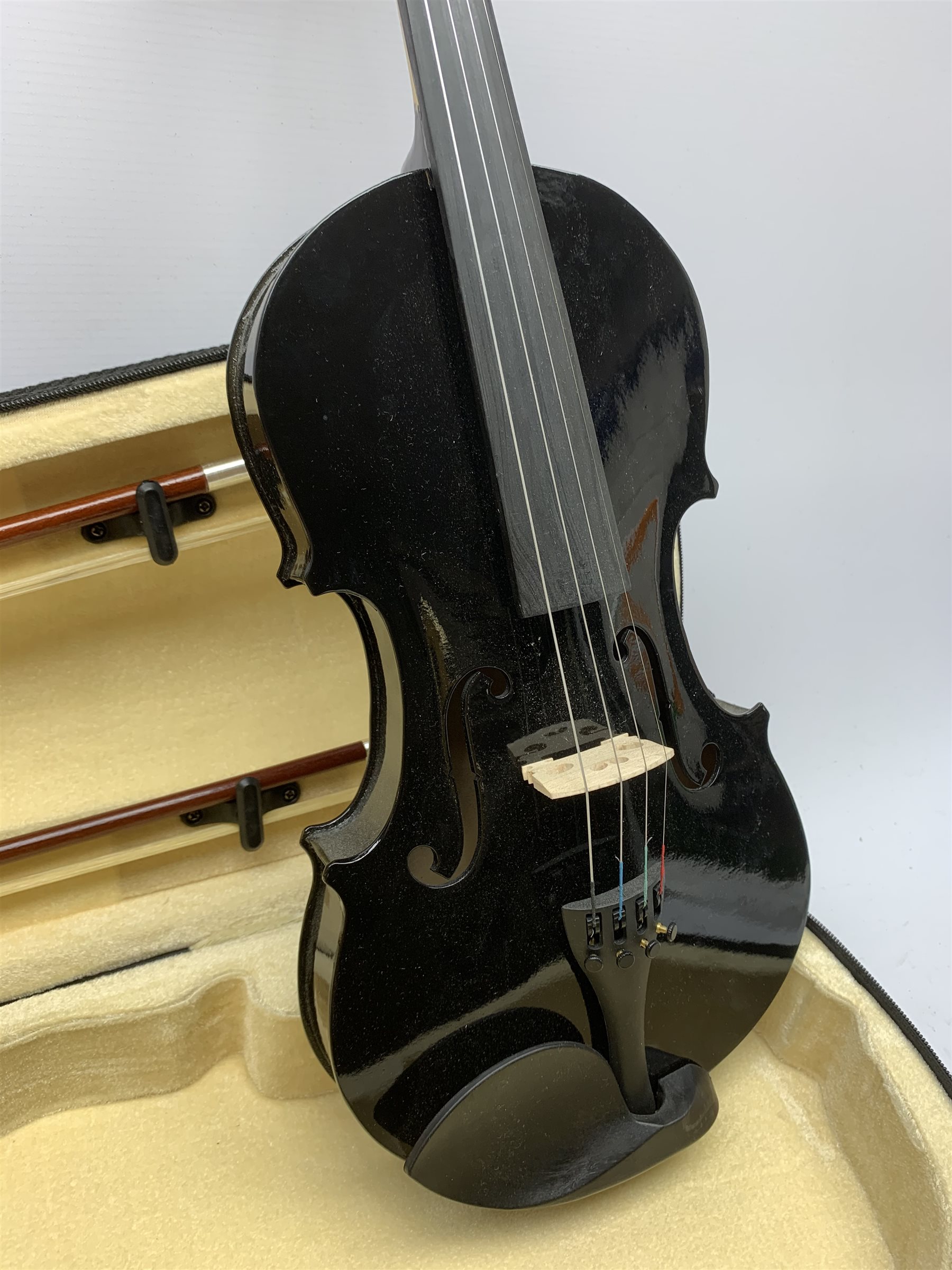 Modern black lacquered violin with 35.5cm back, 59cm overall, in