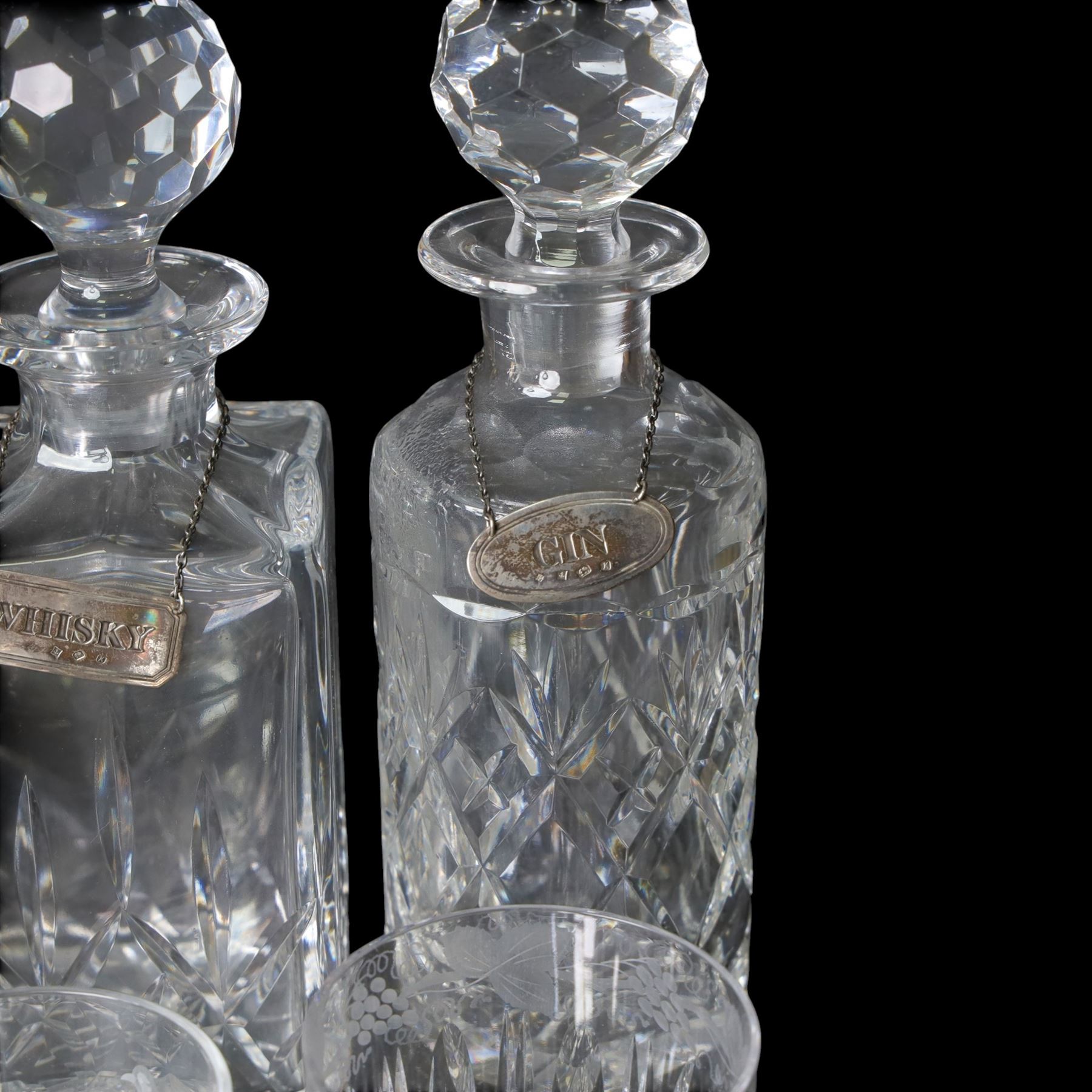Four glass decanters with three silver labels for gin sherry and whisky, hallmarked Birmingham 1984, together with two Stuart Crystal vases and set of four Galloway glasses