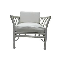 Late 20th century faux bamboo conservatory sofa, white painted frame with geometric openwork back and sides, loose cream cushions, on cylindrical supports (W134cm, D76cm, H80cm); matching armchair (W75cm, D76cm, H80cm); matching coffee table with glass insert (W46cm, D45cm, H36cm)