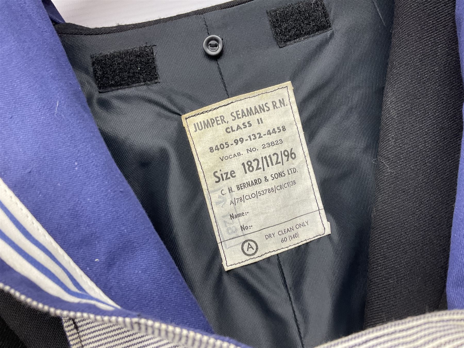 Five military uniforms comprising German Wachbataillon tunic, RASC No.2 dress tunic dated 1963, RAF tunic and trousers dated 1974, RE No.1 tunic and RN Seamans jumper Class II (5)