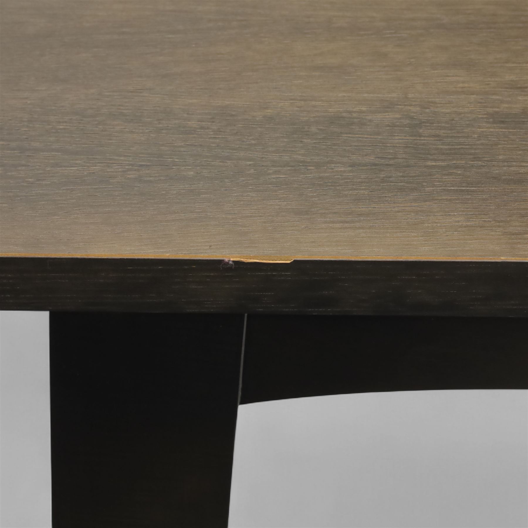 Contemporary black ash finish engineered wood hall table, with bow front top raised on a trestle style base 