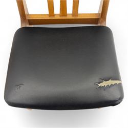 Sutcliffe of Todmorden - mid 20th century ‘S-Form’ teak dining table and chairs, the circular storable extending table with plain veneered top on tapered supports, together with matching dining chairs upholstered in black vinyl, with curved slat backs and shaped front supports, reflecting the sleek organic styling characteristic of 1960s British modern furniture design (Chairs H 93cm, W 46cm, D 46cm) (Extended 168cm)