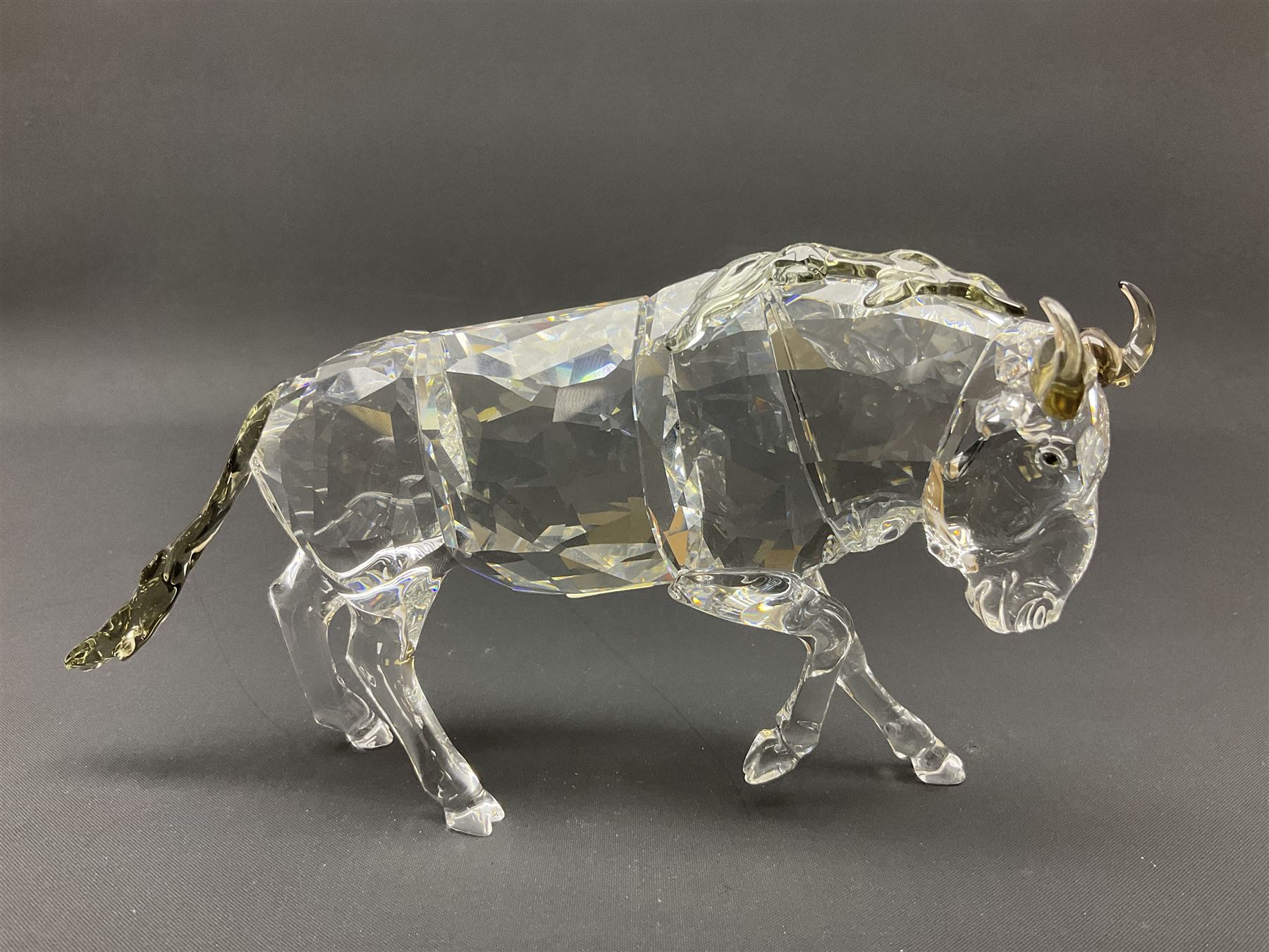 Swarovski Crsytal Society coloured animals, comprising zebra, giraffe and water buffalo, tallest H17.5cm