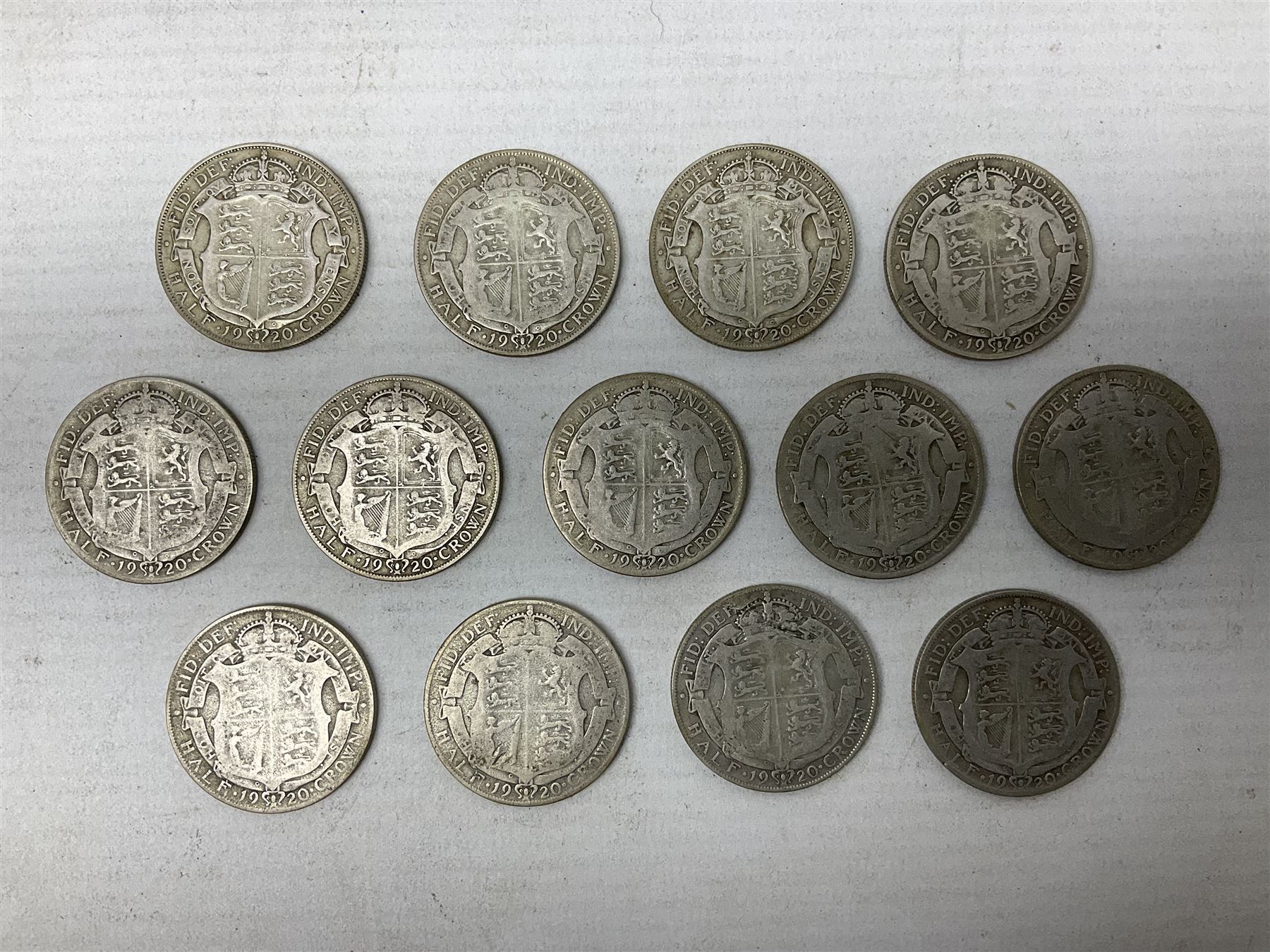 Thirteen King George V 1920 half crown coins