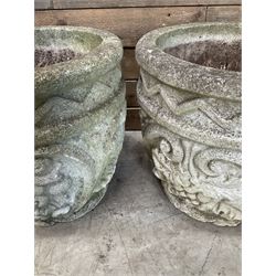 Pair of cast stone ornate circular planters