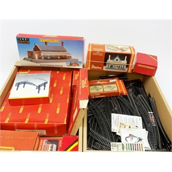 Hornby/Tri-ang '00' gauge - Central Station, Dunster Station and Booking Hall un-made kits; Station Over-Roof; all boxed; five other boxed buildings, bridge supports etc; two boxed level crossings and quantity of track etc