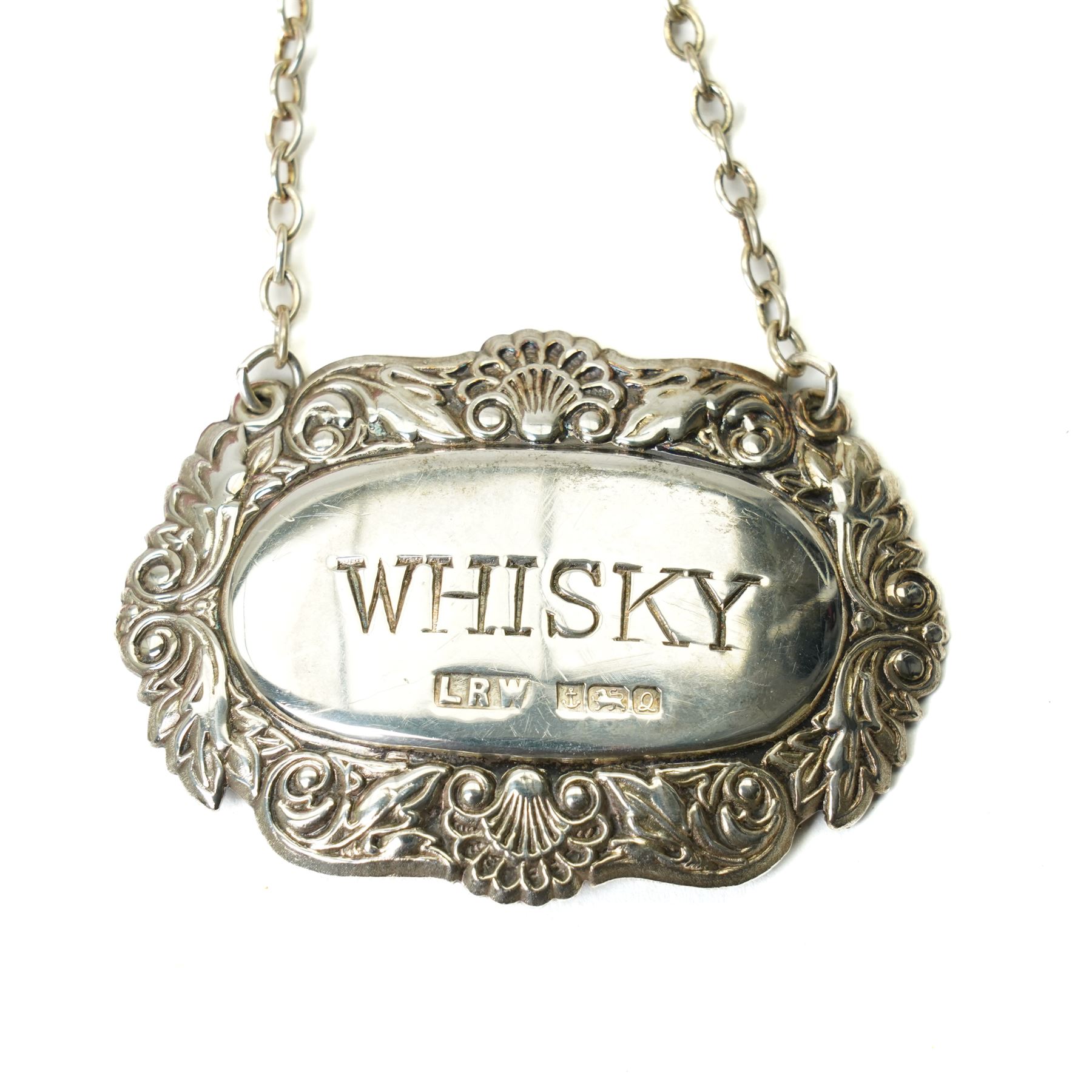 Silver fish knife, Sheffield 1915, two silver decanter labels, Whisky and Sherry, small silver circular box, three silver handled serving implements and glass jar with silver cover 