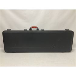 Fender Precision Bass guitar, in Olympic White finish with tortoiseshell effect scratchboard, serial no US15103092, in black Fender hard case with Fender strap and warranty card, guitar L116cm