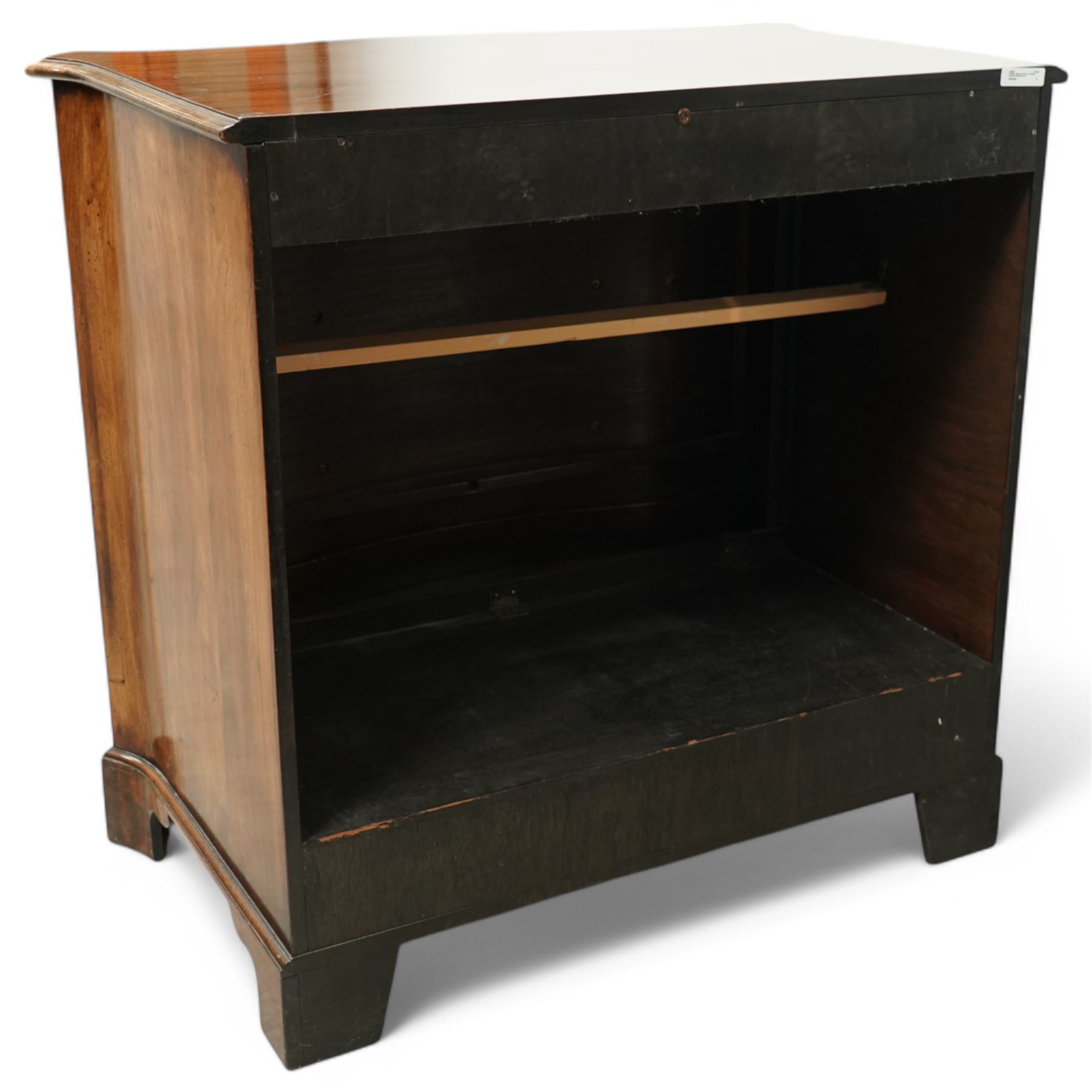 Television cabinet in the form of a Georgian mahogany serpentine chest, flanked by blind fret work decoration, retractable hinged dummy drawer panel revealing interior, with brass swan neck handles, supported on bracket feet 
