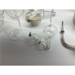 Collection of 19th century and later pharmaceutical laboratory glass, to include, volumetric flasks of various sizes, conical flask, stratus flask, etc (25) Provenance: discovered in the storeroom of a long established Hull pharmacist and opticians