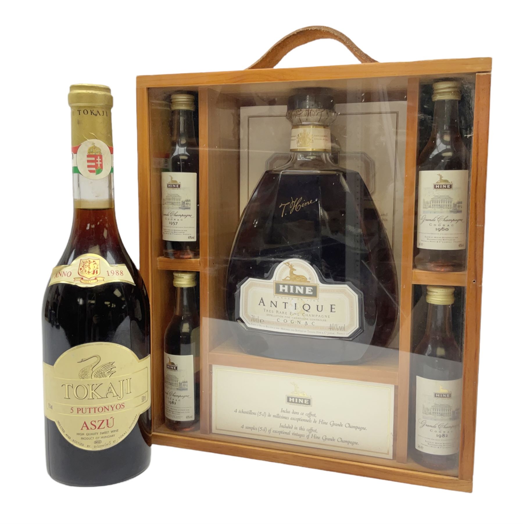 Presentation set comprising Hine Antique cognac 70cl, 40% volume and four miniature bottles of Hine cognac, 1957, 1960, two 1982, all 5cl, 40%   together with bottle of Tokaji sweet wine, 500ml, 13%