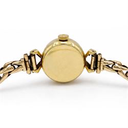 Omega ladies 18ct gold manual wind wristwatch, Cal. 483, gilt dial with diamond and dot hour markers, Helvetia hallmark, on 9ct gold bracelet, with fold-over clasp, Birmingham 1959