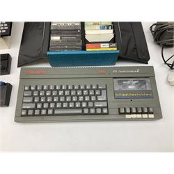 Sinclair 128K ZX Spectrum +2, Sinclair ZX81, both with power leads and quantity of other early computer accessories to include game cassettes, manuals and books etc