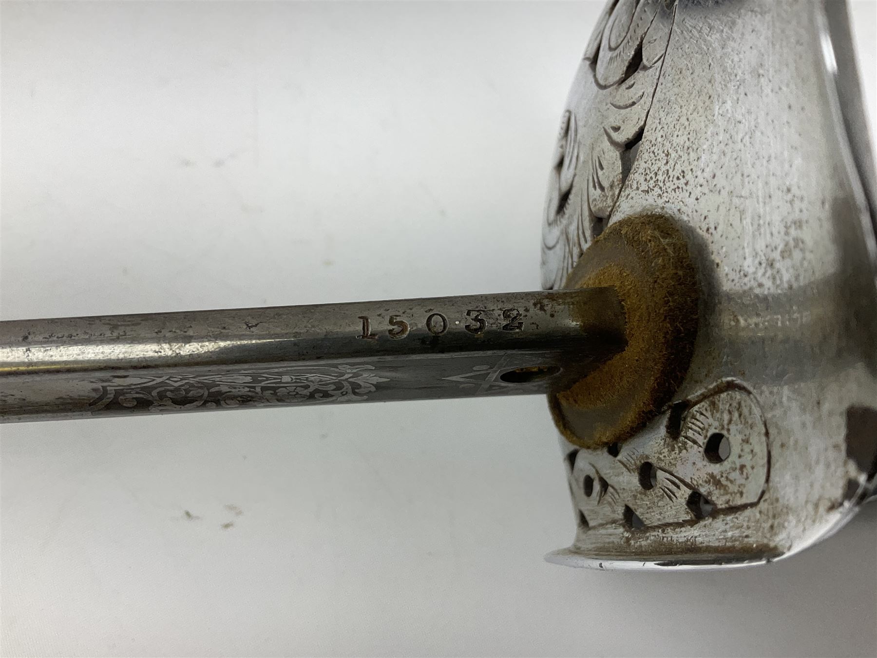 British George V 1897 Pattern Infantry Officers Sword, the 82.5cm fullered steel blade etched and polished with crowned royal arms, GRV cyphers and scrolling foliage, marked Army & Navy Co-operative Society 105 Victoria St London SW to the ricasso,  plated pierced basket hilt with wire bound fish skin grip and leather knot, No.15032; in leather covered scabbard