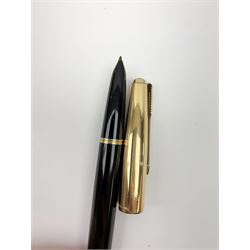 A Parker 51 fountain pen, with black body and rolled gold cap, in Parker 51 case, together with another Parker fountain pen, in maker's box, and a Parker Rialto fountain pen. (3). 