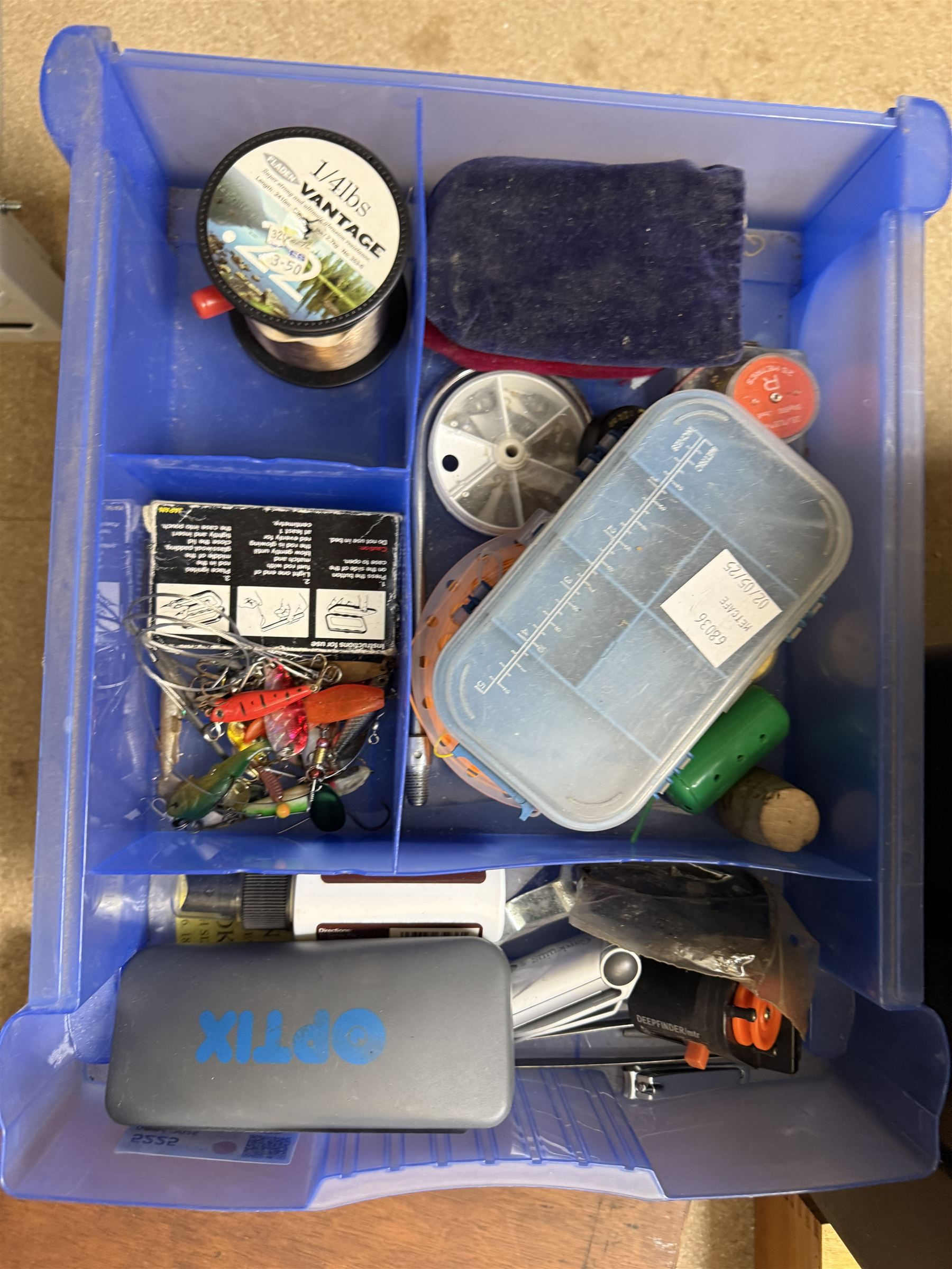 Fishing equipment, including two Fladen Vantage reels, split cane rod, hooks, line, lures etc, in Leeda plastic box and table top plastic drawers
