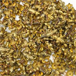 Large quantity of Victorian brass upholstery pins with rosette and fleur de lis designs 
Provenance: property of a Nobleman