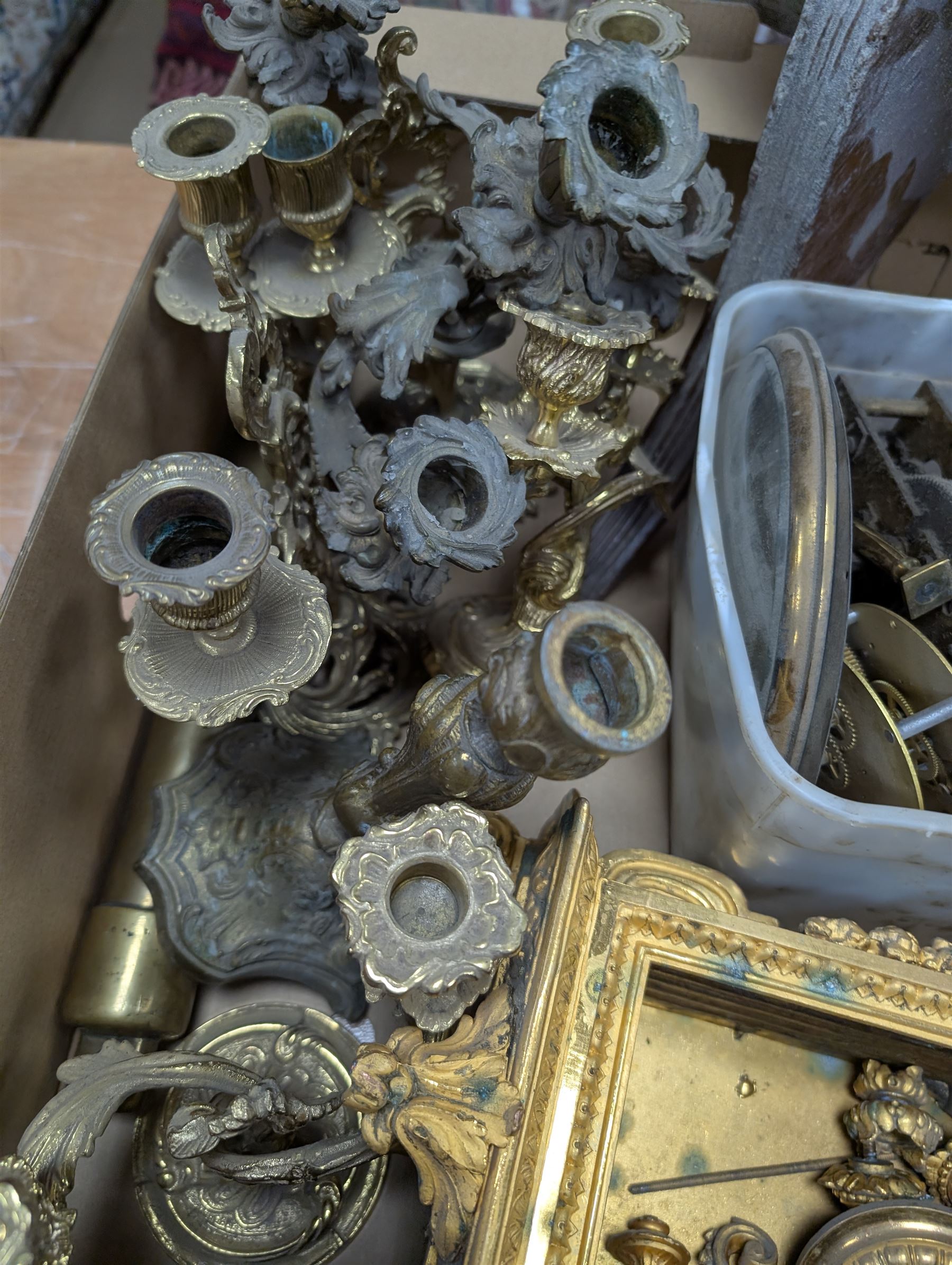 Collection of leather carriage clock cases, brass mantle clocks and parts, brass candlesticks etc, in two boxes