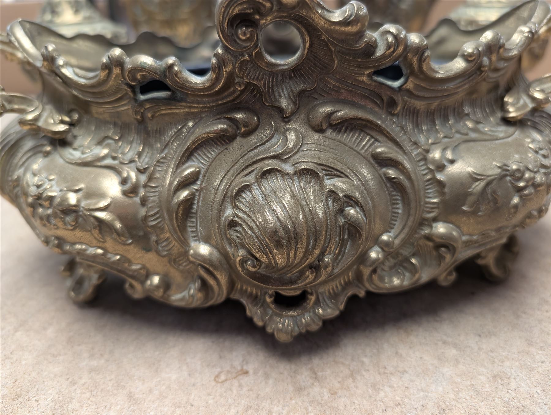 Brass twin handled planter, pair of pierced brass bottle neck vases and three other brass vases