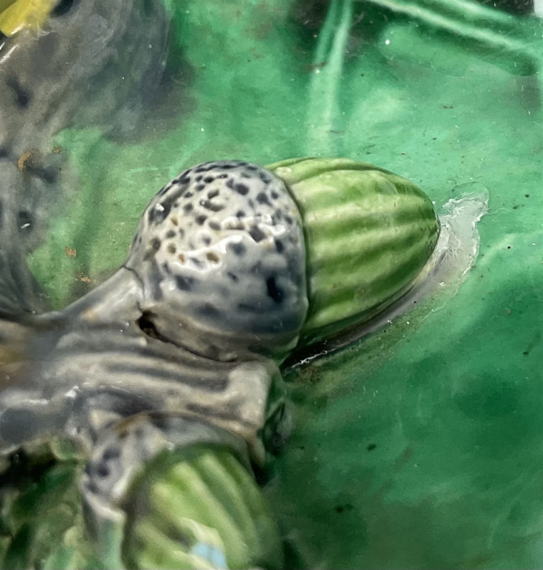 Minton majolica leaf dish, modelled as a Blue Tit perched on a branch with acorns and an oak leaf, date cypher for 1868, impressed marks beneath, L21cm. 